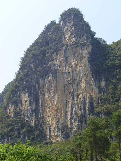 Yangshuo, Birdman (Ptačí muž). Touto stěnou vede naše cesta